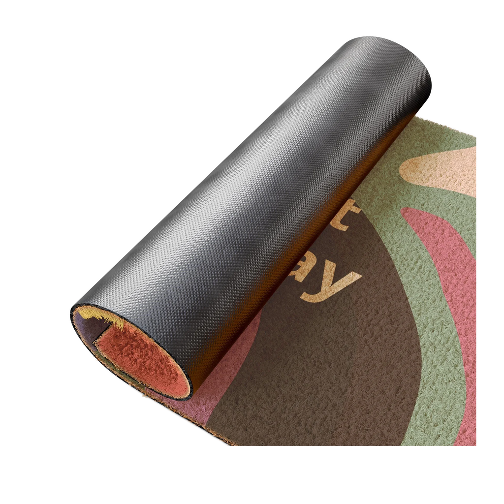 A rolled view of the Colorful Pride Welcome Mat showing the textured coir top and non-slip rubber vinyl backing.
