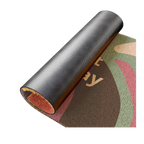 A rolled view of the Colorful Pride Welcome Mat showing the textured coir top and non-slip rubber vinyl backing.