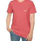 A person wearing the coral silk perf retro graphic t-shirt in an outfit styling.