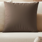 Country Brown faux suede pillow case styled on a couch in a modern living room.