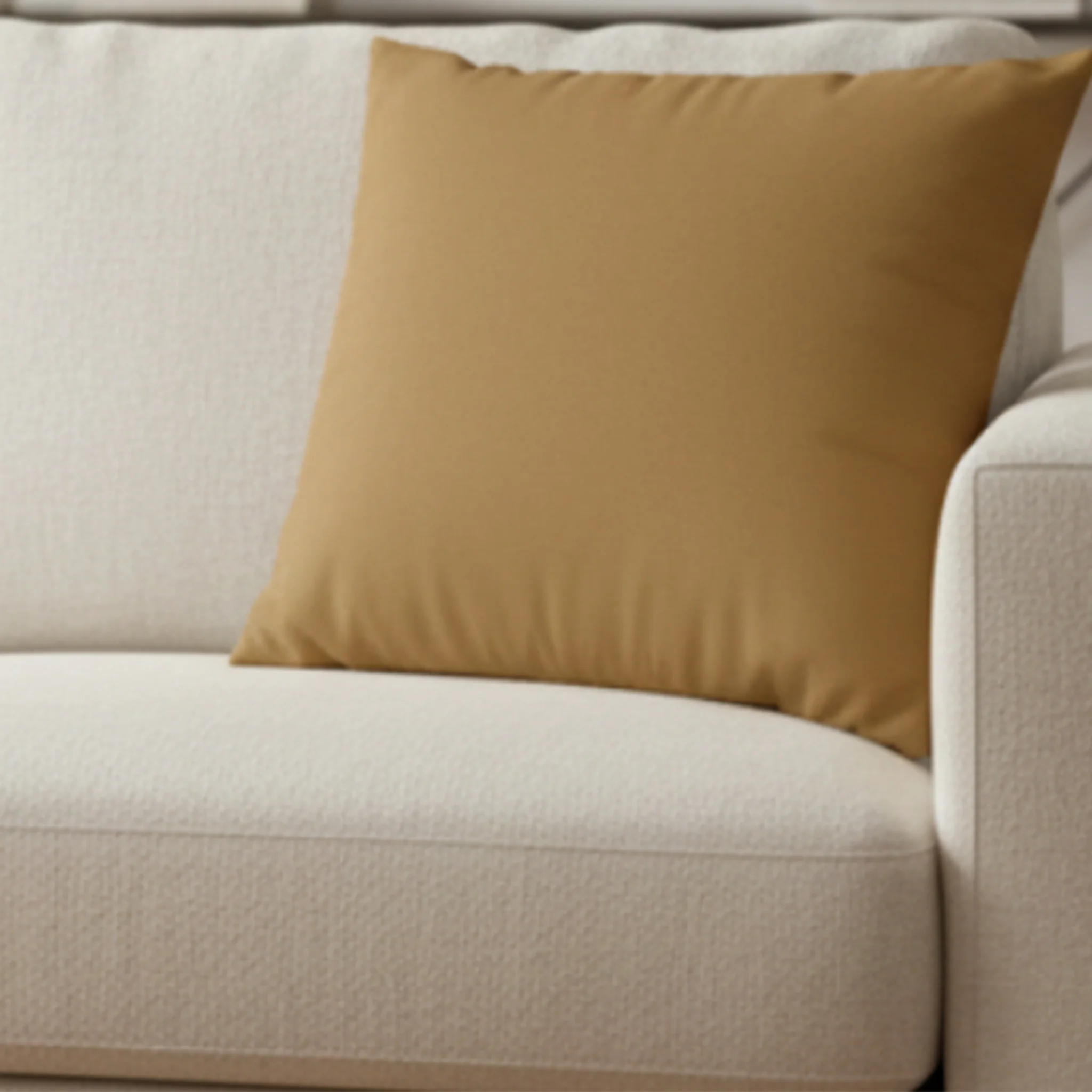 Driftwood Brown faux suede pillow case styled on a couch in a modern living room.