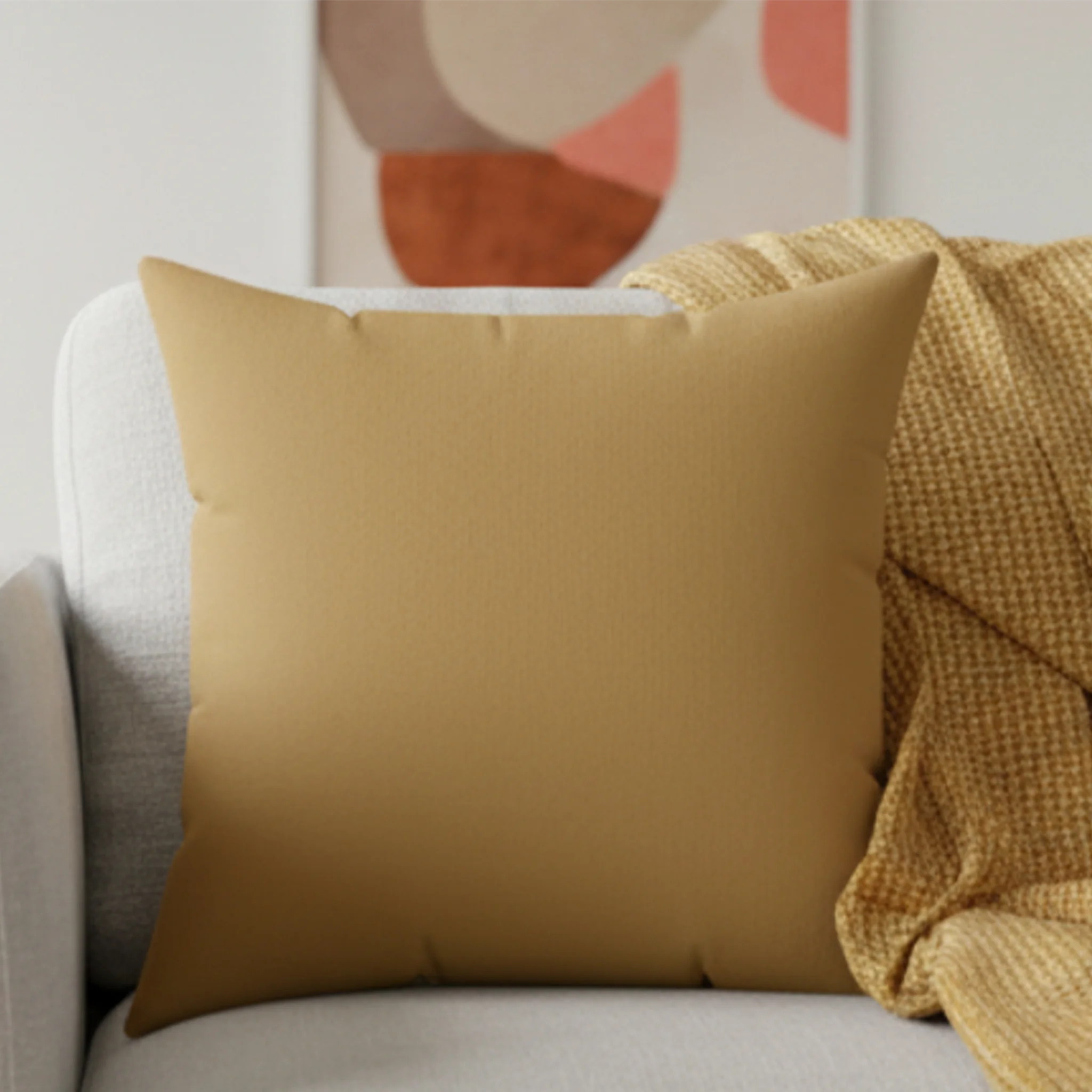 Driftwood brown faux suede pillow styled on sofa, earthy neutral home decor.
