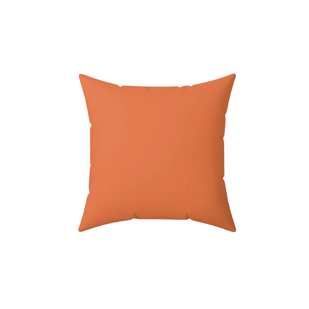 Dusty orange faux suede throw pillow, back view.