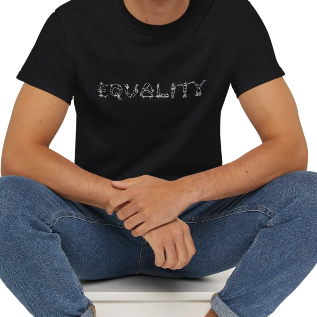 EQUALITY skater script graphic tee, black, front view on person, seated relaxed pose.