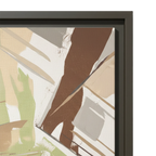 Close-up of espresso floating frame edge and sage abstract canvas print texture detail.
