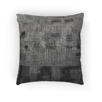 A back view of the Faded Geometric Net Patterned Woven Pillow showing a black background and abstract black and white hash grid lines.