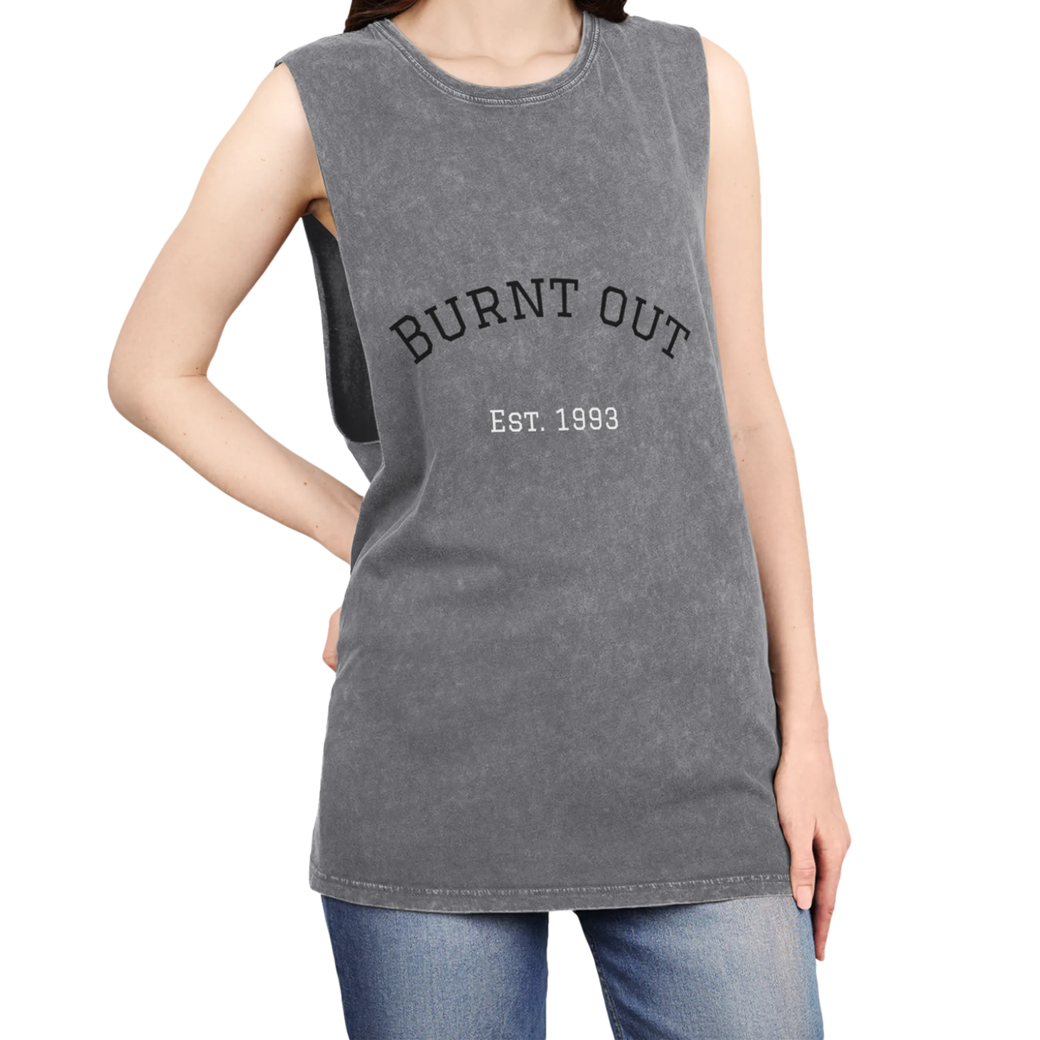A person wearing the ash stonewash personalized muscle tank with a black arched 'Burnt Out Est. 1993' graphic — custom birth year gift idea for him or her.