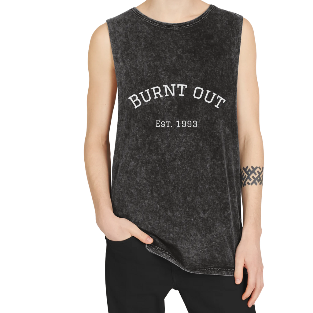A person wearing the black stonewash personalized muscle tank with a white arched 'Burnt Out Est. 1993' graphic — custom birth year gift idea for him or her.