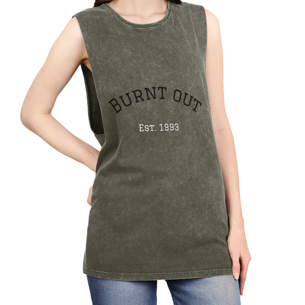 A person wearing the moss stonewash personalized muscle tank with a black arched 'Burnt Out Est. 1993' graphic — custom birth year gift idea for him or her.