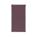 Dusky Orchid cotton waffle throw blanket laid flat, showing its textured surface and fringed ends.