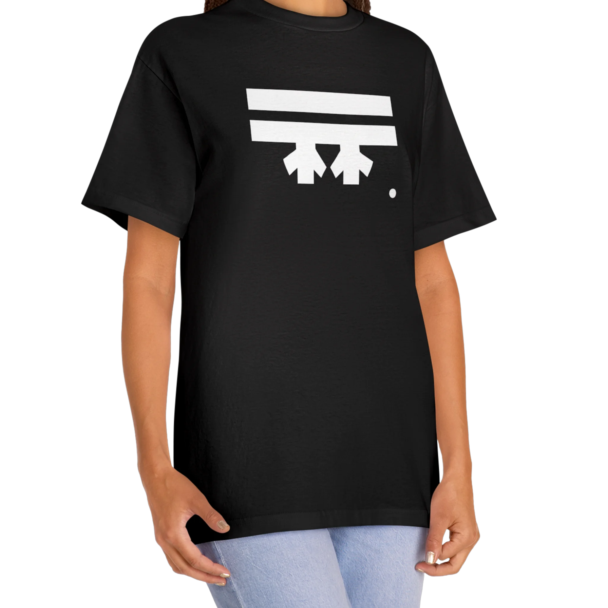 A woman wearing a black FREEBRD Logo Classic T-Shirt, close-up showing the white FREEBRD logo on the chest.