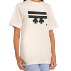 A woman wearing a cream FREEBRD Logo Classic T-Shirt, close-up showing the black FREEBRD logo on the chest.