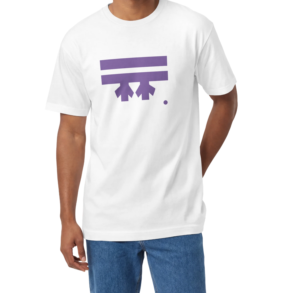 A man wearing a white FREEBRD Logo Classic T-Shirt, close-up showing the purple FREEBRD logo on the chest.