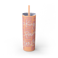 Freebrd Making Positive Changes 20oz glossy peach blush skinny stainless steel tumbler with white glitter handwritten script text and matching peach straw front view.