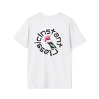 A white t-shirt featuring a retro pink polaroid camera with a Freebrd photo print and 'Instant Classic' circular wrap text graphic on the back.