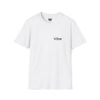 A white t-shirt with a dark 'Vibe' wordmark on the left chest and a black FREEBRD logo on the inner neck label.