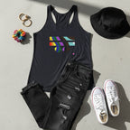 Vintage black FREEBRD rainbow wave racerback tank, styled flat lay with distressed denim, white sneakers, and bucket hat, streetwear aesthetic.