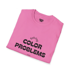A folded preview of the pink azalea t-shirt with 'solving color problems daily’ black text design on the chest.