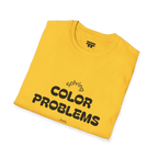 A folded preview of the yellow daisy t-shirt with 'solving color problems daily' black lettering text design on the front.