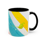 Freebrd Stripe Status 11oz coffee mug right side view showing green and white paint splash texture with yellow and teal brushstrokes and black interior.
