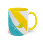 Freebrd Stripe Status 11oz coffee mug right side view with teal and yellow stripe design green paint splashes and yellow C-handle with yellow interior.