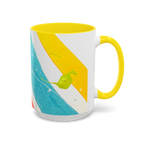 Freebrd Stripe Status 15oz coffee mug right side view with teal and yellow brushstrokes green paint splashes and yellow interior and yellow C-handle.