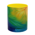 Freebrd vibrant abstract petal wave ceramic mug with swirling yellow green blue and orange design and yellow interior 11oz.