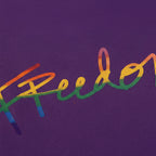 Freedom! Rainbow Script Premium T-Shirt, purple, rainbow script graphic detail, DTG print close-up, FREEBRD Pride Gear.