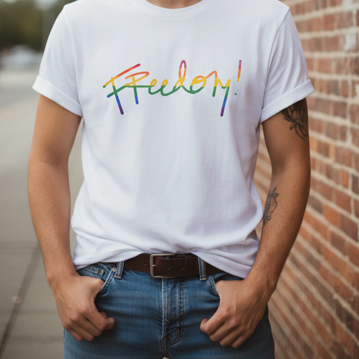 Freedom! Rainbow Script Premium T-Shirt, white, outdoor natural light, relaxed confident style,  lifestyle.
