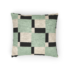 A horizontal view of the Fresh Green Carbon Floater Checker Woven Pillow showing fresh green checker squares floating above carbon fiber black checker squares on an oatmeal cream background. 