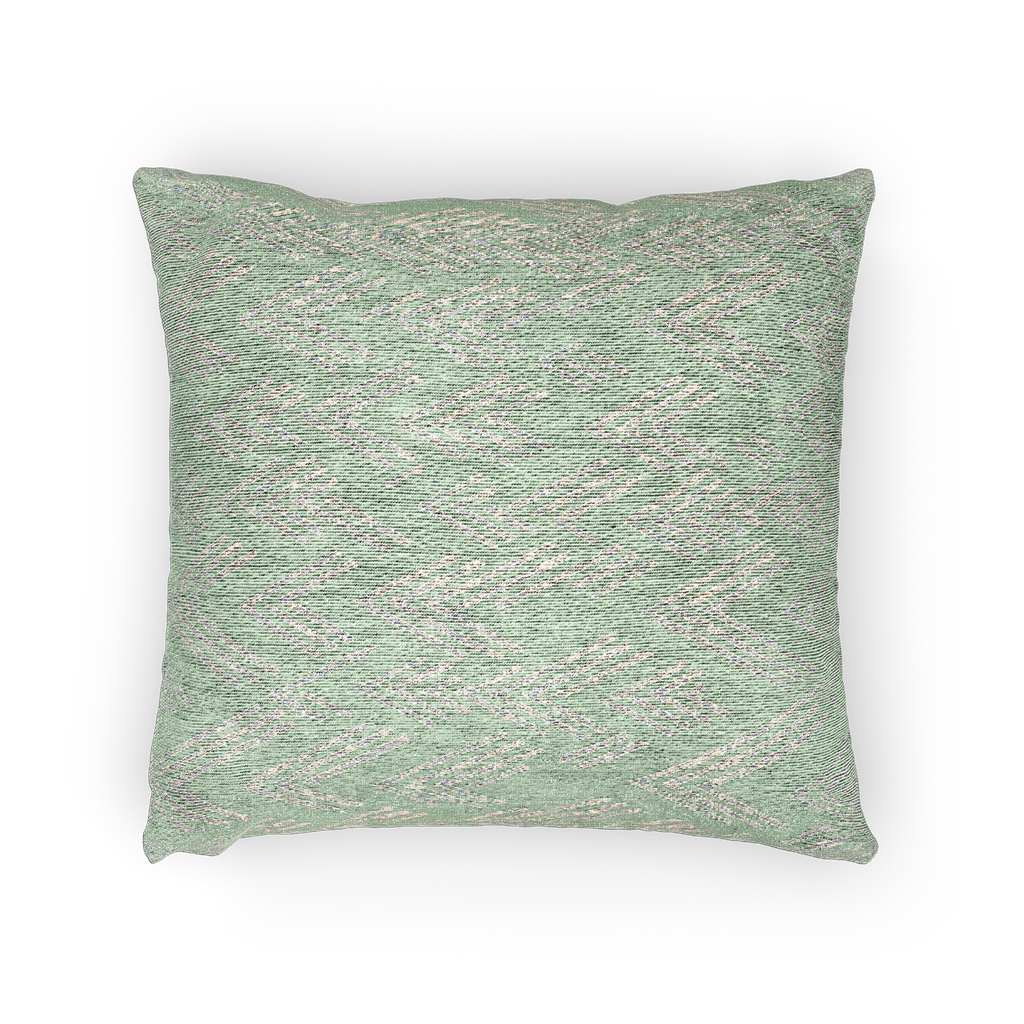 A horizontal view of the Fresh Green Mint Ikat Woven Pillow showing a fresh green background and ivory white chevron ikat styled lines.