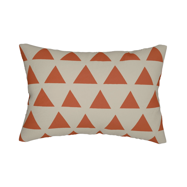 Geometric terracotta triangle lumbar pillow, front view.
