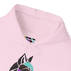 Close-up of a light pink hoodie neckline showing a multicolored FREEBRD LGBTQIA Pride inner-neck logo, matching drawstrings and part of the geometric wolf graphic.