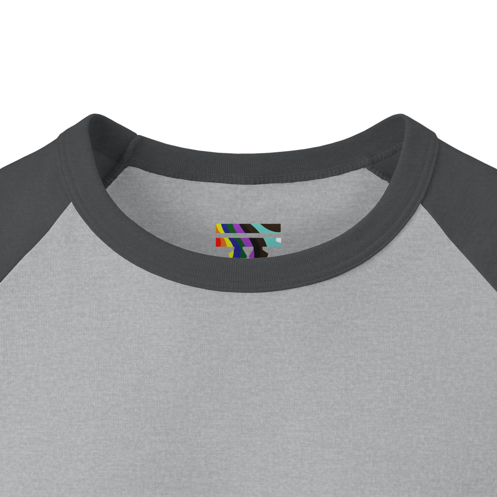 Close-up of a charcoal ribbed collar and heather grey inner neckline, showing a small FREEBRD LGBTQIA+ Pride logo inside the neck.