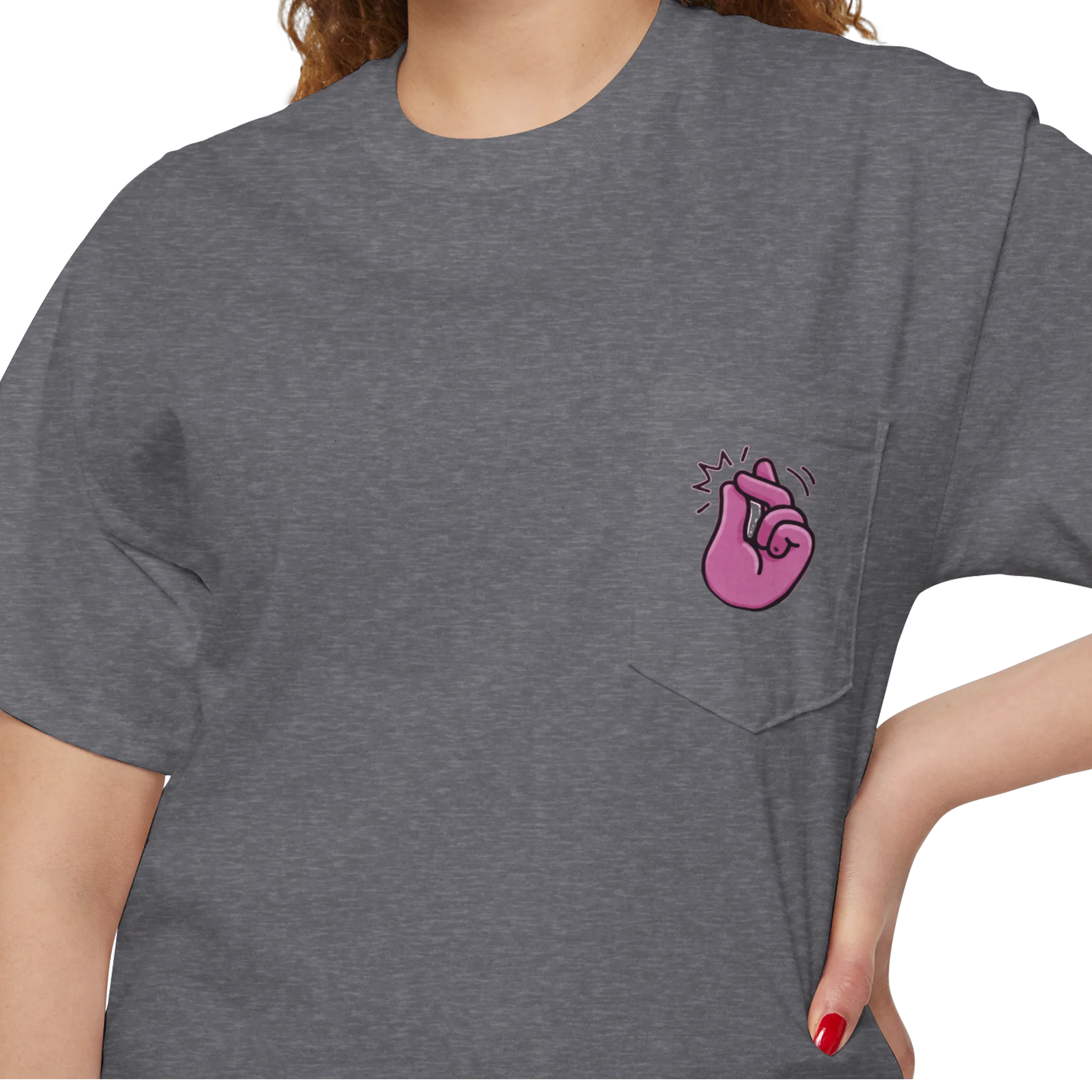 A person wearing a FREEBRD graphite heather classic cotton pocket t-shirt with a baby pink cartoon finger-snap 'Clock It' graphic printed on the front chest pocket.