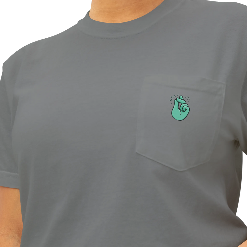 A grey pocket t-shirt with a sea green Clock It Motif on front left chest pocket shown up close.