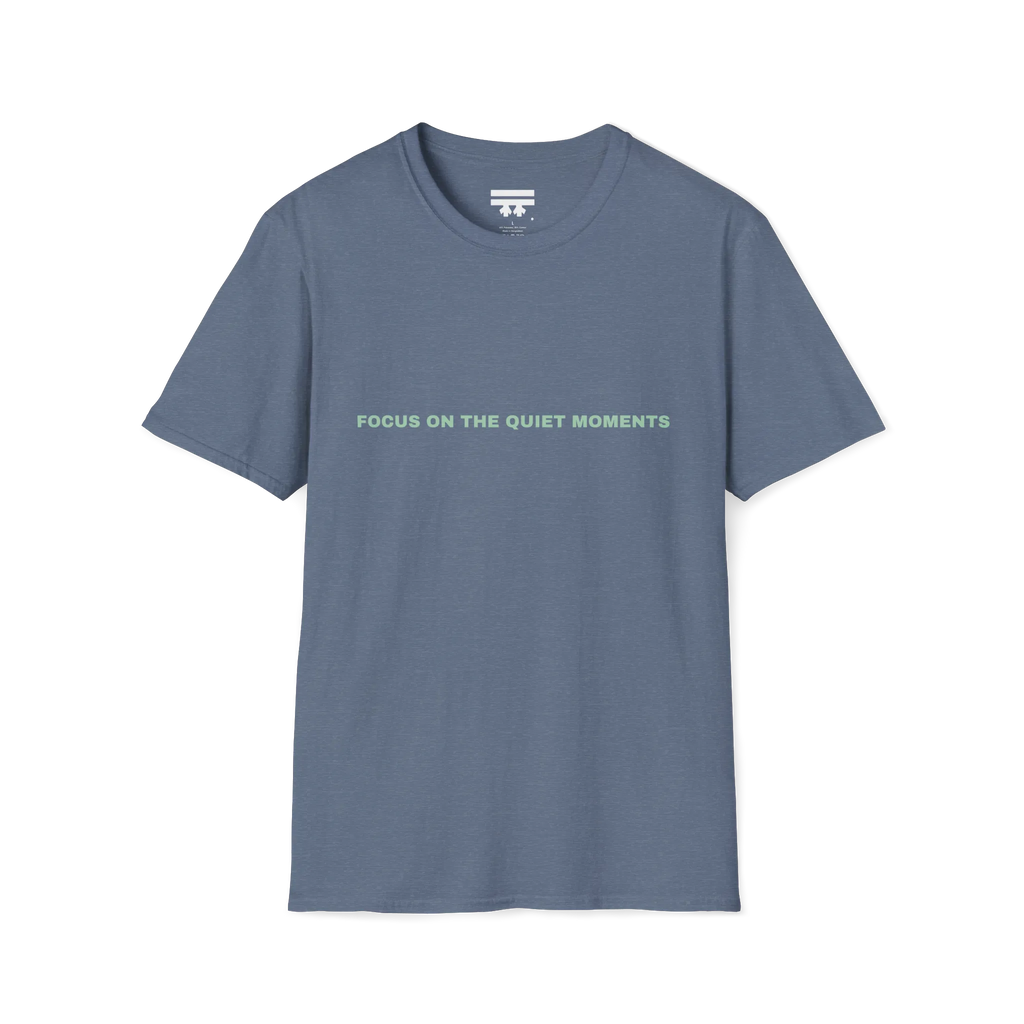 A  heather indigo t-shirt with sea green Focus On The Quiet Moments text on the chest.