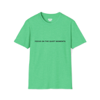 A heather irish green t-shirt with purple Focus On The Quiet Moments text on the chest.