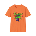 A heather orange t-shirt with a graffiti-style 'Human Rights' graphic featuring a purple fist and 'human rights' in lime green with a black shadow.