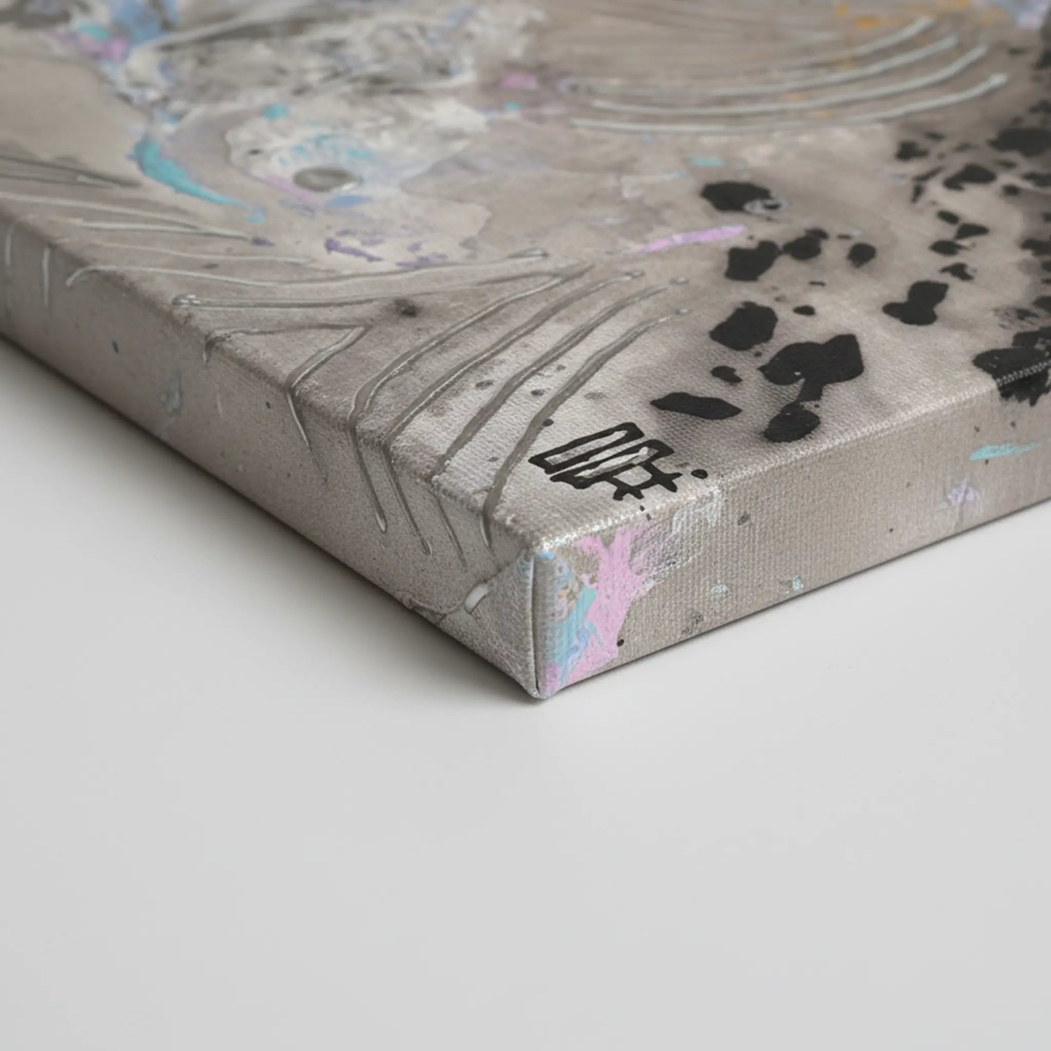 20x24 "Ink Cloud" Freebrd Abstract Canvas Wall Art — side depth shot showcasing 1.25" thick gallery-wrap canvas edge with true-to-color smoky grey, silver and black ink artwork wrapping the sides