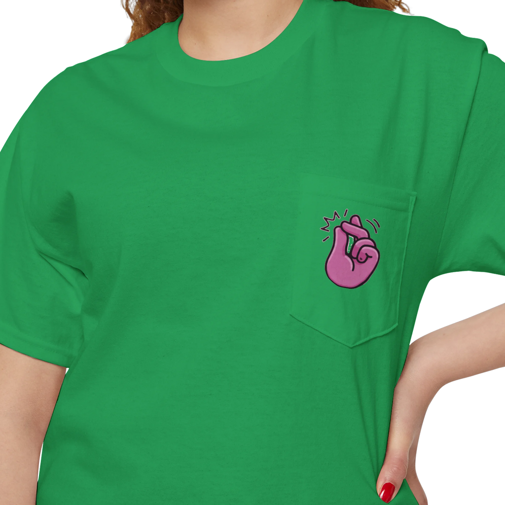 A person wearing a FREEBRD Irish green classic cotton pocket t-shirt with a baby pink cartoon finger-snap Clock It graphic printed on the front chest pocket.