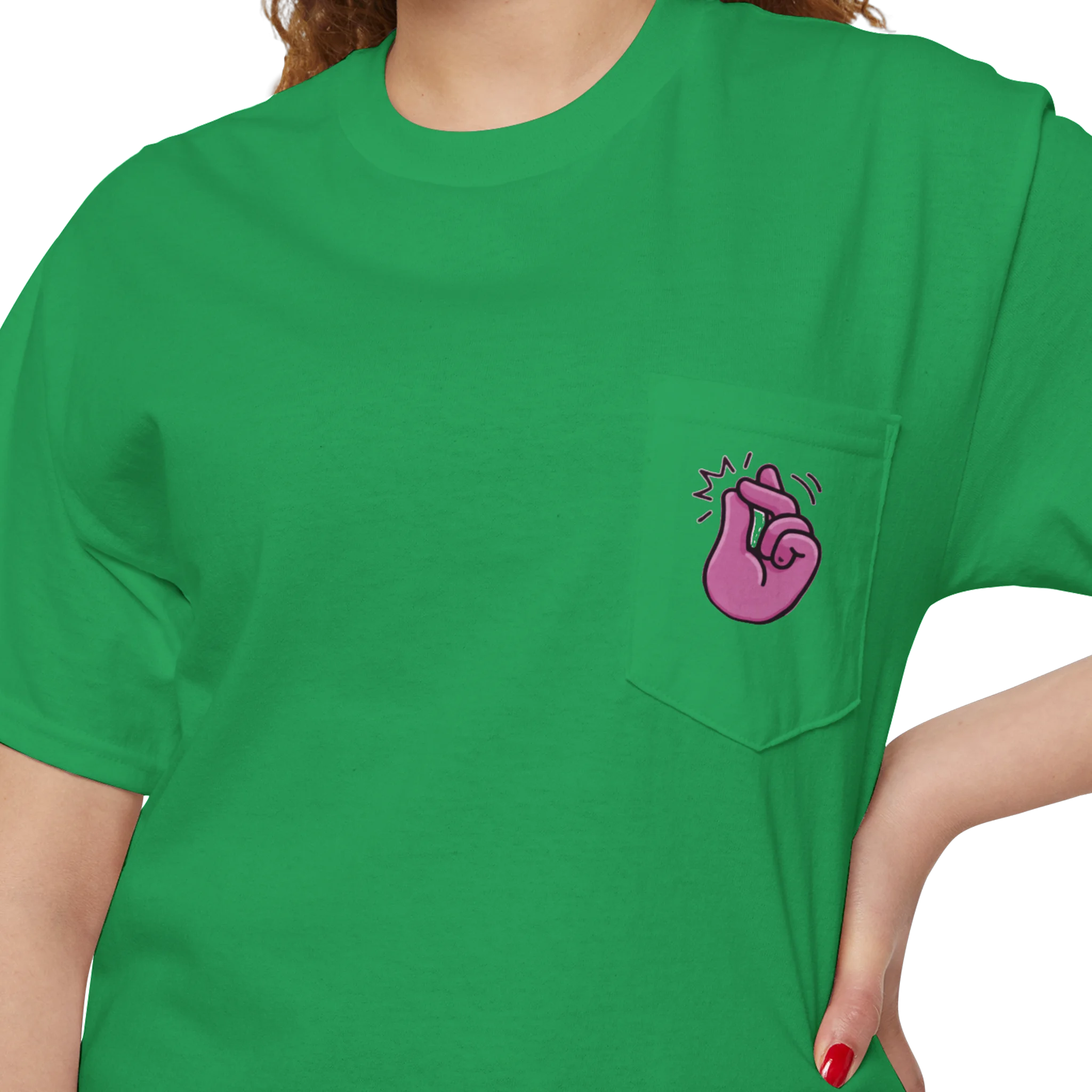 A person wearing a FREEBRD Irish green classic cotton pocket t-shirt with a baby pink cartoon finger-snap Clock It graphic printed on the front chest pocket.