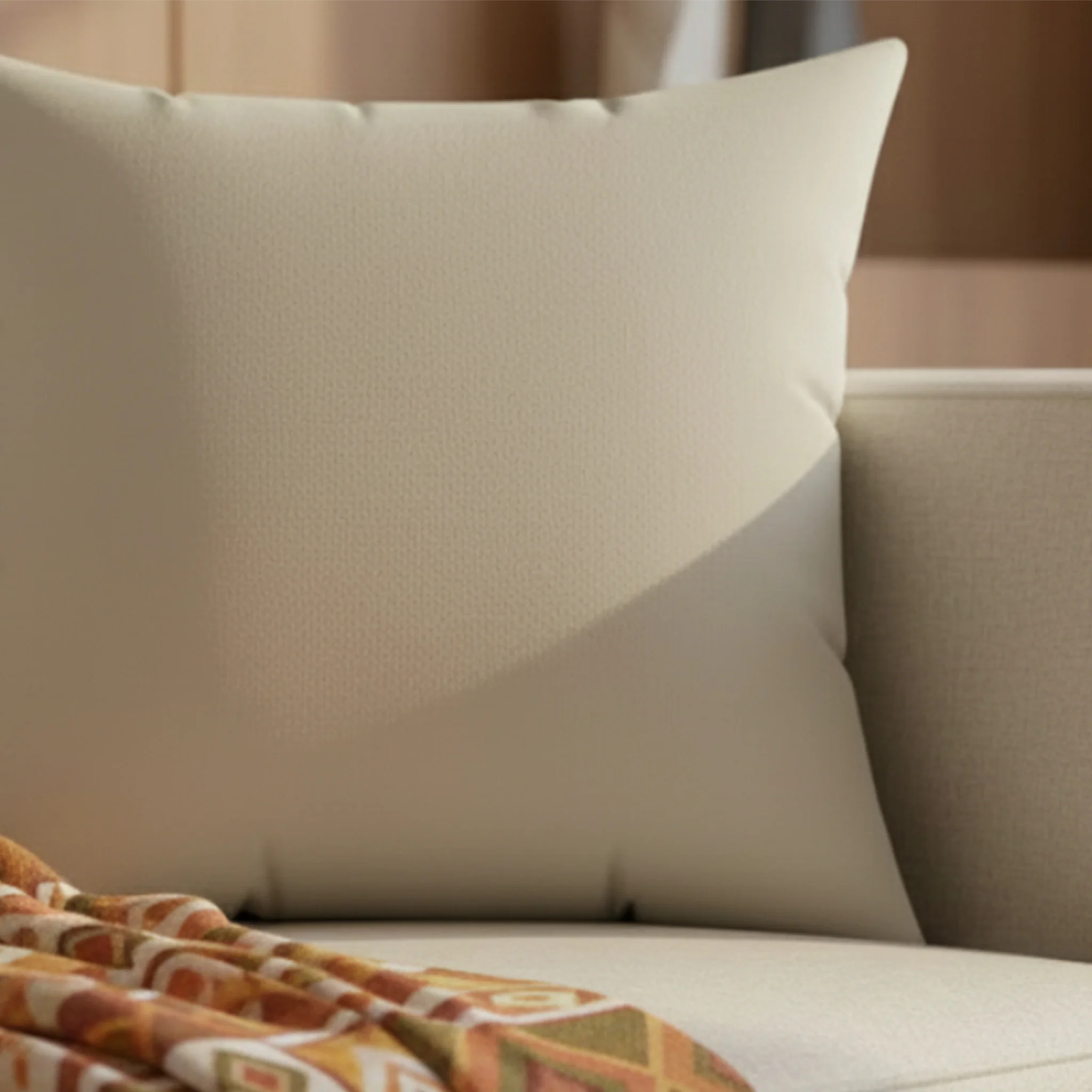 Ivory grey faux suede pillow styled on sofa, soft neutral minimalist home decor.