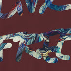 Live Free Afrostar Script Premium Tee, maroon, graphic detail, fluid pour art.