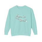 Chalky mint crewneck pullover with white Love is Peace lettering and a dark offset shadow, front view.