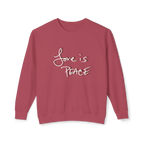 Crimson crewneck pullover with white Love is Peace lettering and a dark offset shadow, front view.