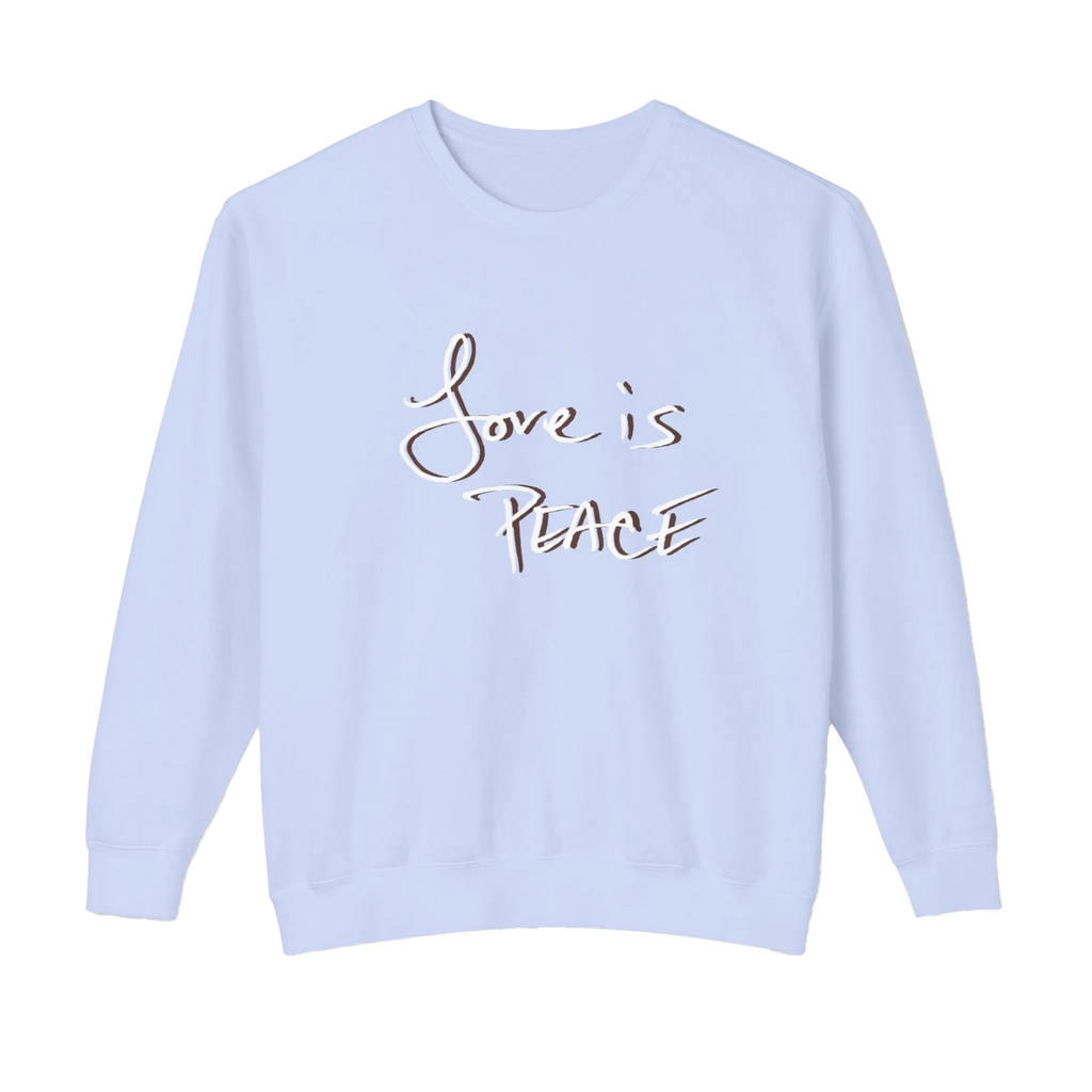 Pale lavender-blue crewneck pullover with white Love is Peace lettering and a dark offset shadow, front view.