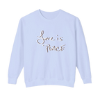 Pale lavender-blue crewneck pullover with white Love is Peace lettering and a dark offset shadow, front view.