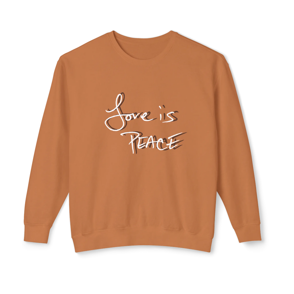 Burnt orange crewneck pullover with white Love is Peace lettering and a dark offset shadow, front view.