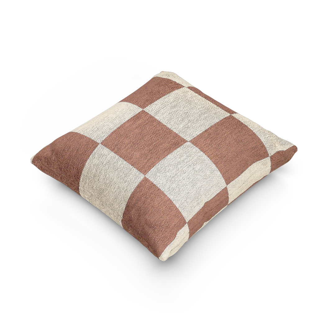 A side view of the Mimosa Pink Woven Checker Pillow, showing a mimosa pink checker pattern on an oatmeal cream colored background. 